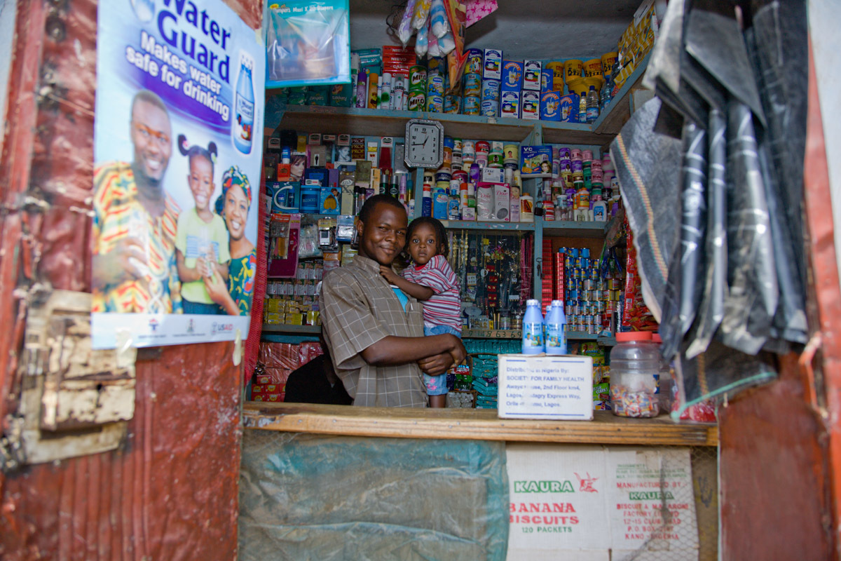 A shop in the Gyadi-Gyadi area of Kano, Nigeria prominently displays a Waterguard advertisement on the door. Waterguard, a chlorine product that makes water safe to drink, protects against diarrheal diseases that are life-threatening to children under five.