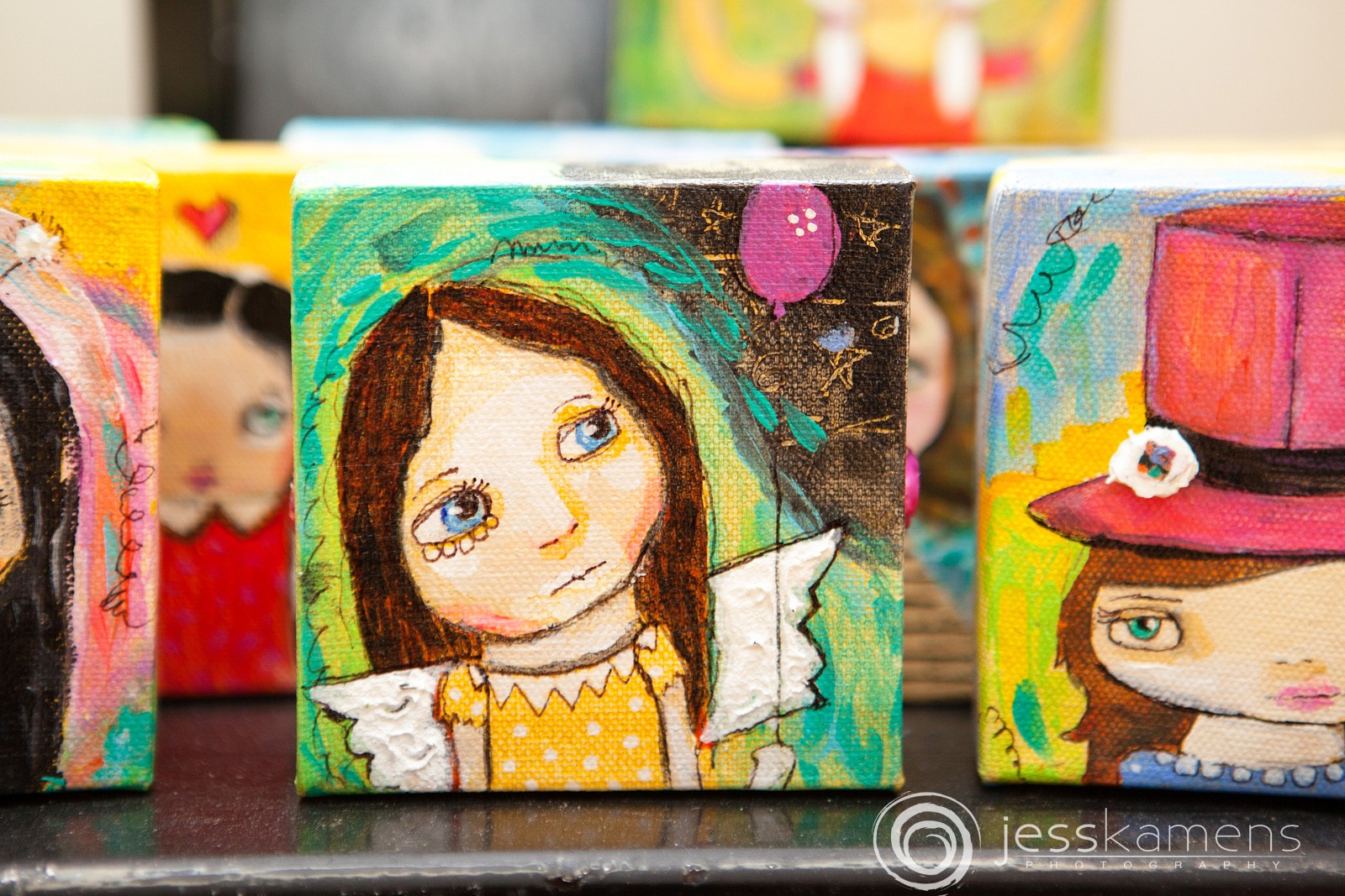 Artist Renée A. Schuls-Jacobson's small canvas paintings
