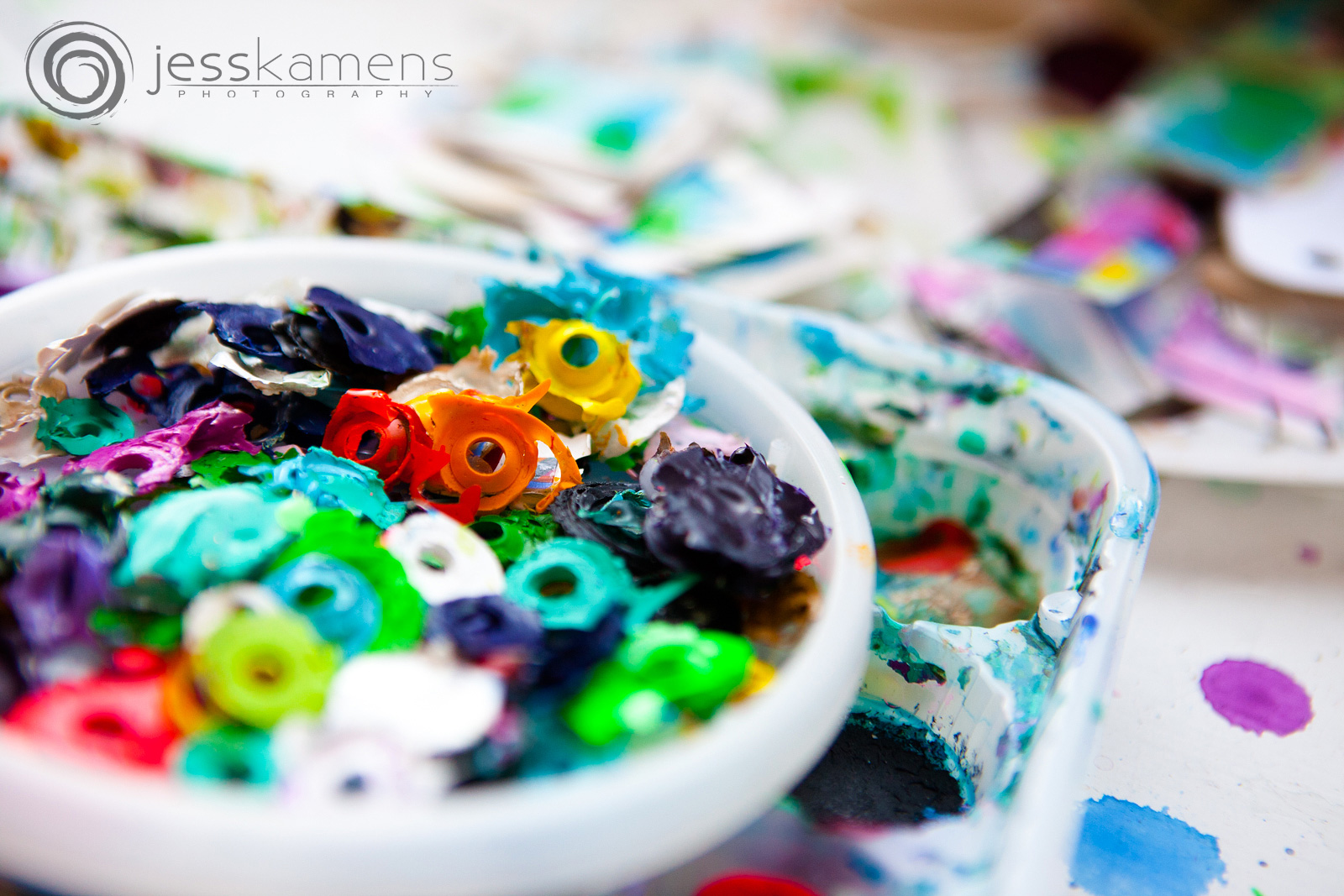 dried paint from the top of acrylic tubes