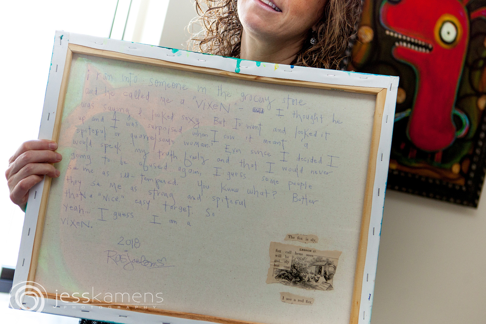writing on the back of a canvas telling the story of that canvas