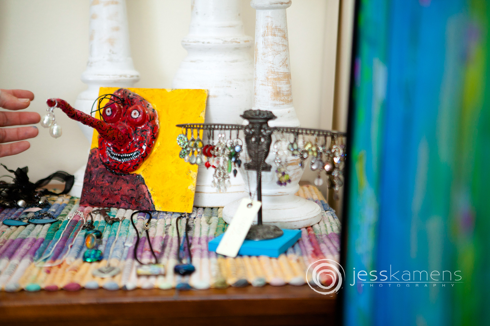 decorations of a handmade jewelry holder with earrings on it