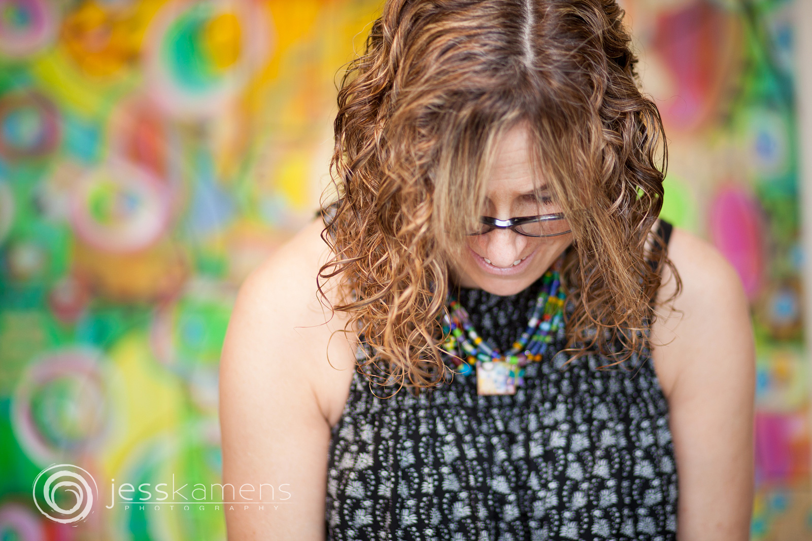 Renée A. Schuls-Jacobson laughs while she creates her work