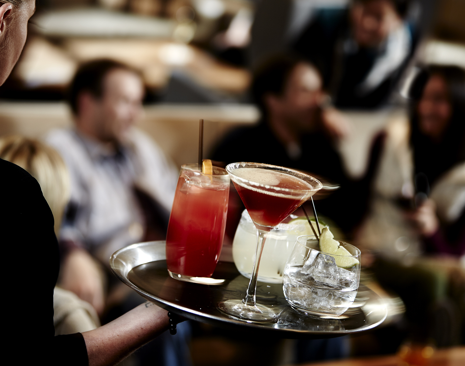 Lifestyle food in action photographed by Jessica Grenier showing a chef plating a dish.