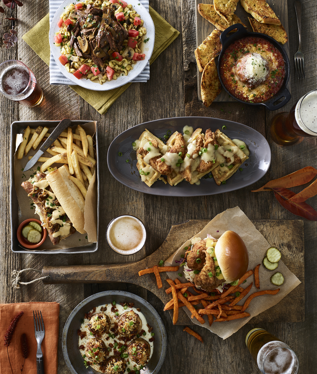 Food in motion image by Jessica Grenier capturing the pouring action of a sauce for advertising use.