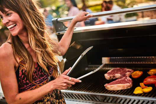 Lifestyle food in action photographed by Jessica Grenier showing a chef plating a dish.