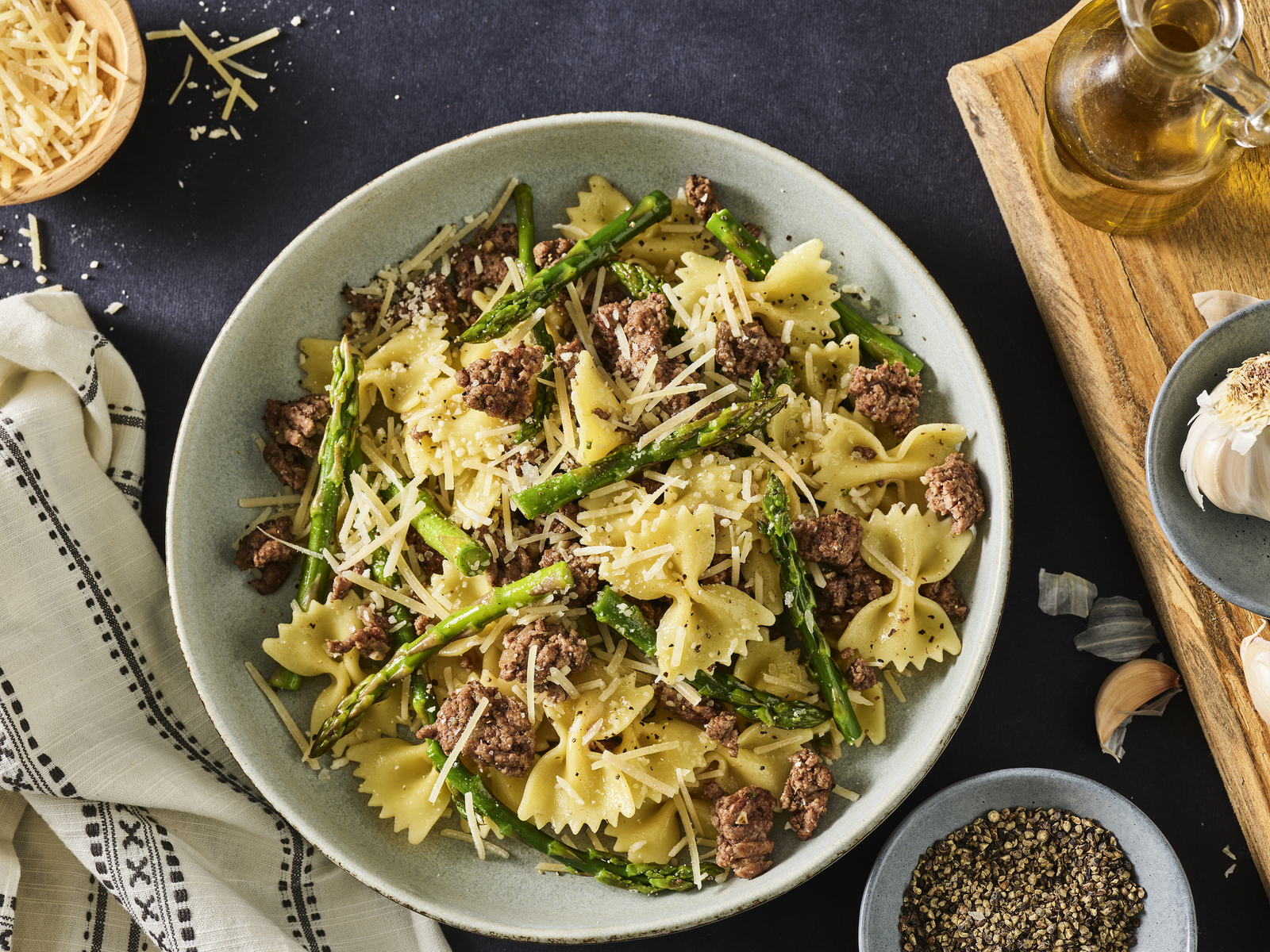 Food in motion image by Jessica Grenier capturing the pouring action of a sauce for advertising use.