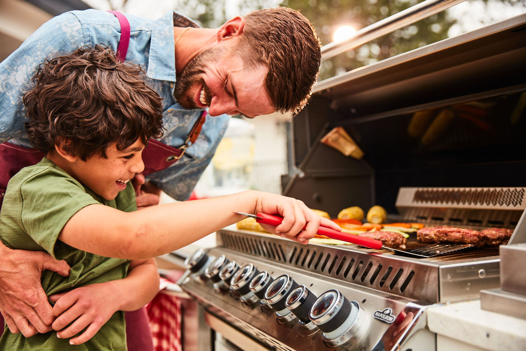 Lifestyle food in action photographed by Jessica Grenier showing a chef plating a dish.