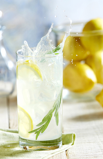 Food in motion image by Jessica Grenier capturing the pouring action of a sauce for advertising use.